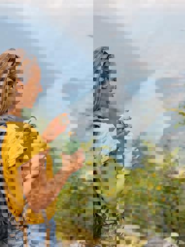 Hiking Woman With Water Bottle Getty (1)