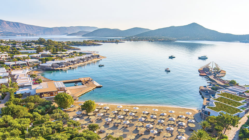 Stay at a landmark address on Crete’s coast