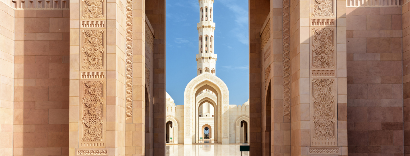 View Of Minaret Through Arches Of Sultan Qaboos Grand Mosque (1)
