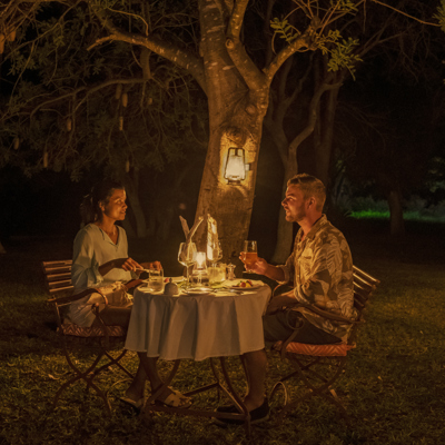 Gather around the campfire for a boma dinner