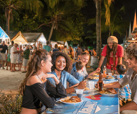 Attend Oistins Fish Fry