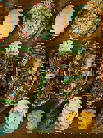 Street food and rooftop dining in Arusha or Dar es Salaam