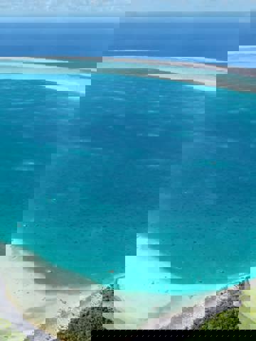 Dive pristine Tuamotu coral atolls