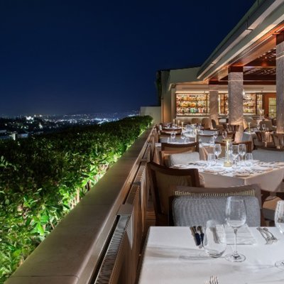 Rooftop dining over Athens